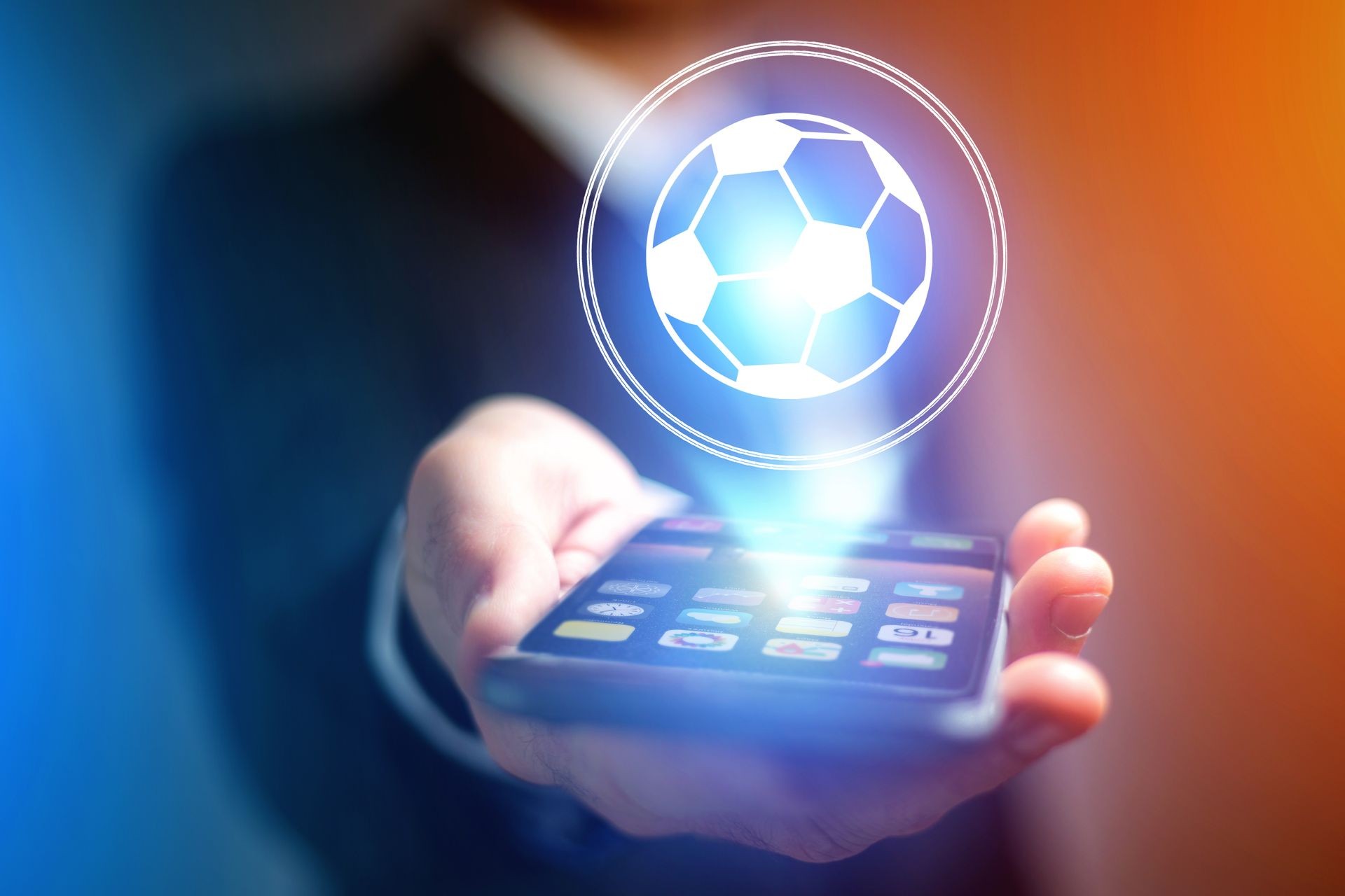 View of a Soccer ball icon over device - Sport and technology concept
